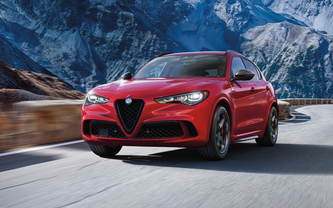Front side view of an Alfa Romeo Stelvio 2024 on a mountain road